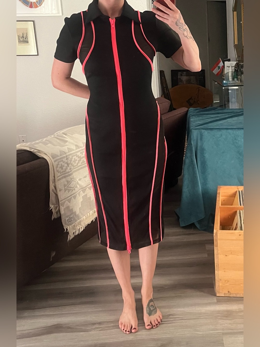 Capsule midi, comfy, flattering, with spicy mesh panels and a double zipper.